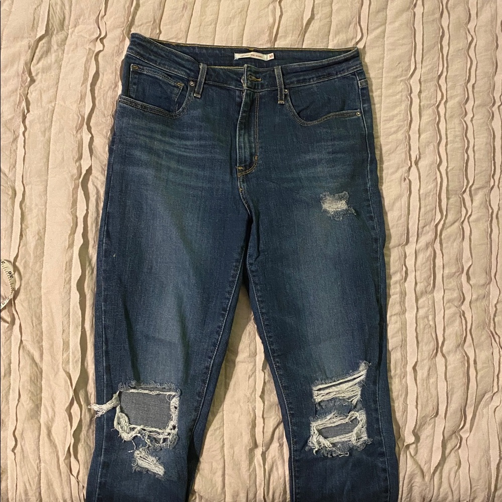 Levi’s 721 high rise skinny Distressed Blue Jeans
